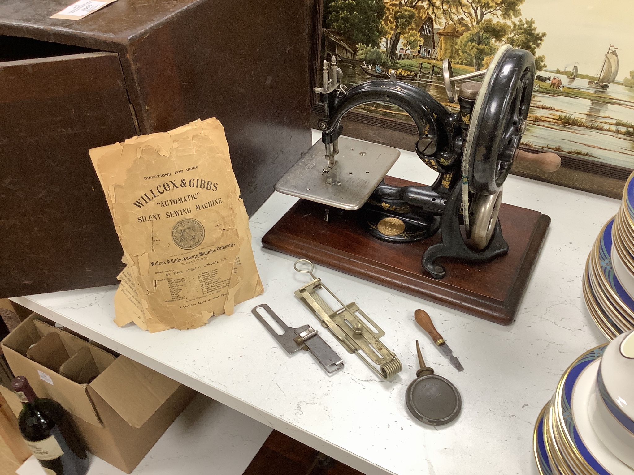 Two cased vintage portable sewing machines, Willcox and Gibbs, 32cms wide